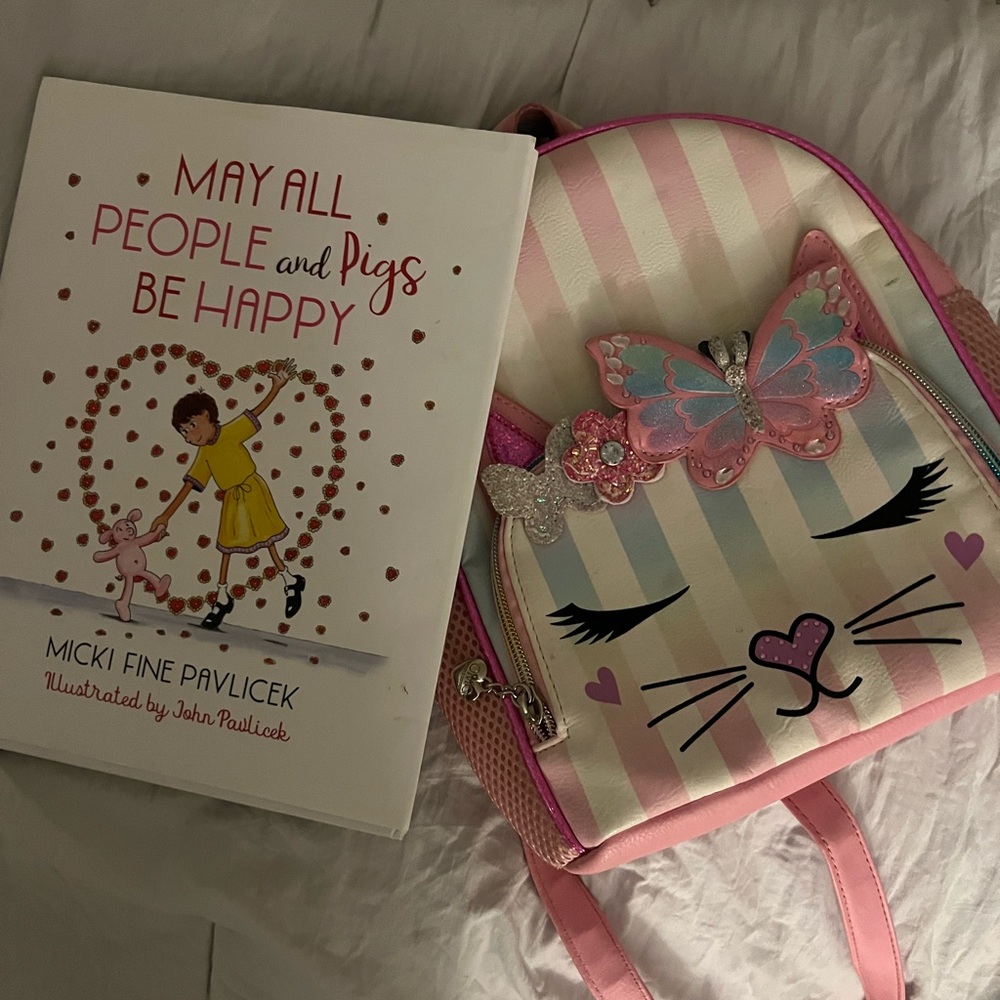 Bundle brand new book and gently used backpack